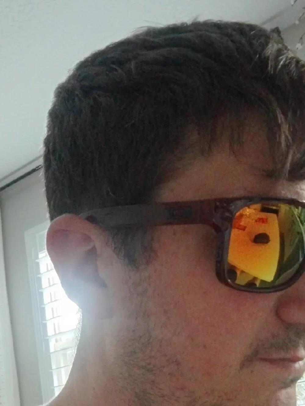 Oakley Men’s Translucent Red Holbrook Sunglasses with Green Mirrored Lenses